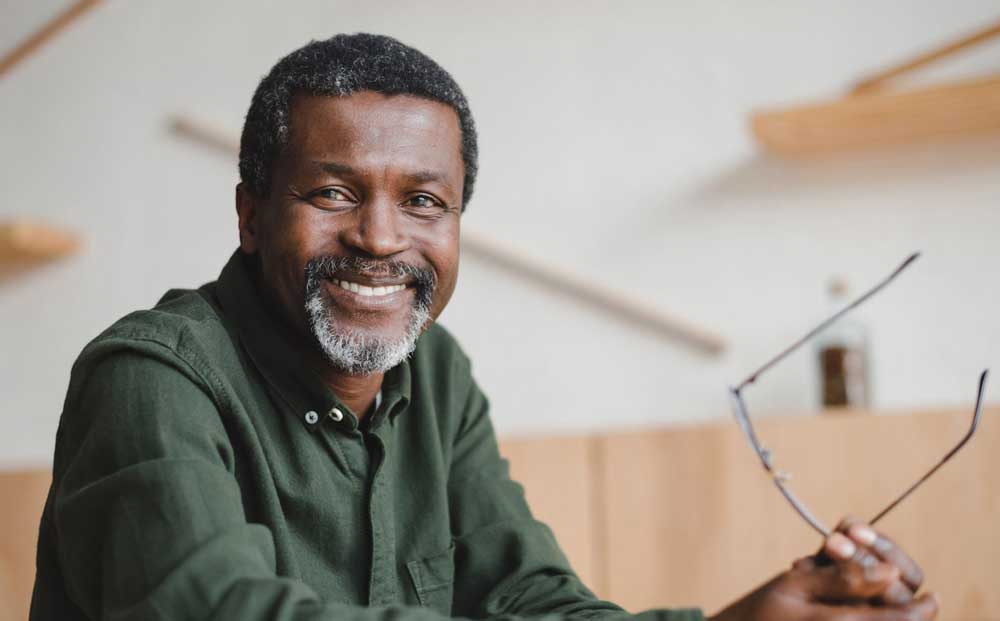 dental patient smiling after sleep apnea treatment