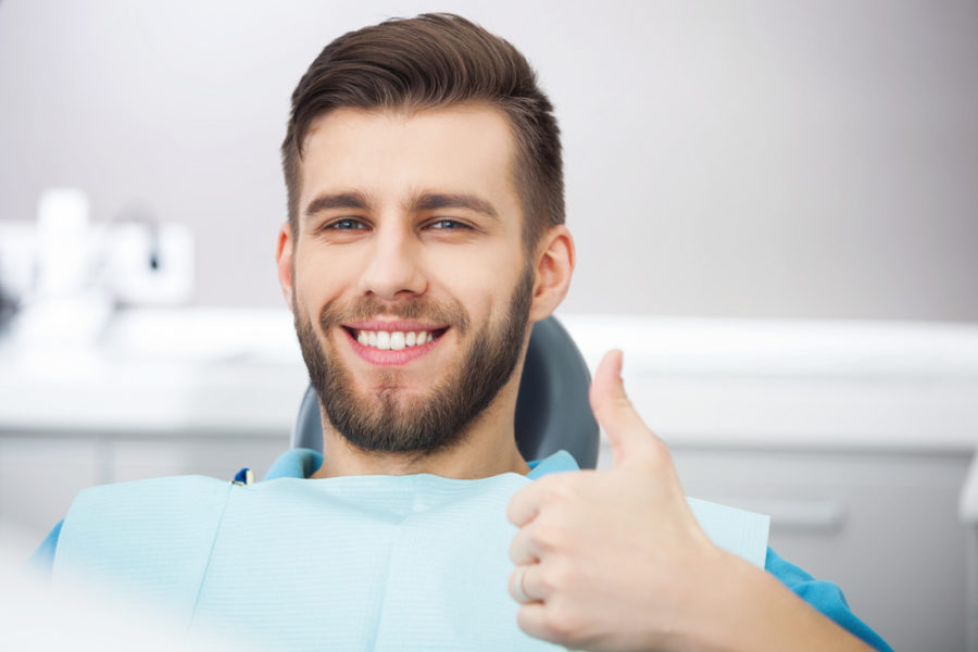 dental patient smiling after gum disease treatment