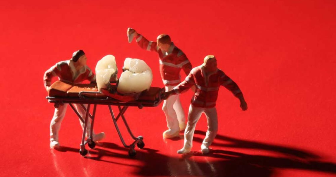Emergency dentists carrying a cracked tooth on a stretcher